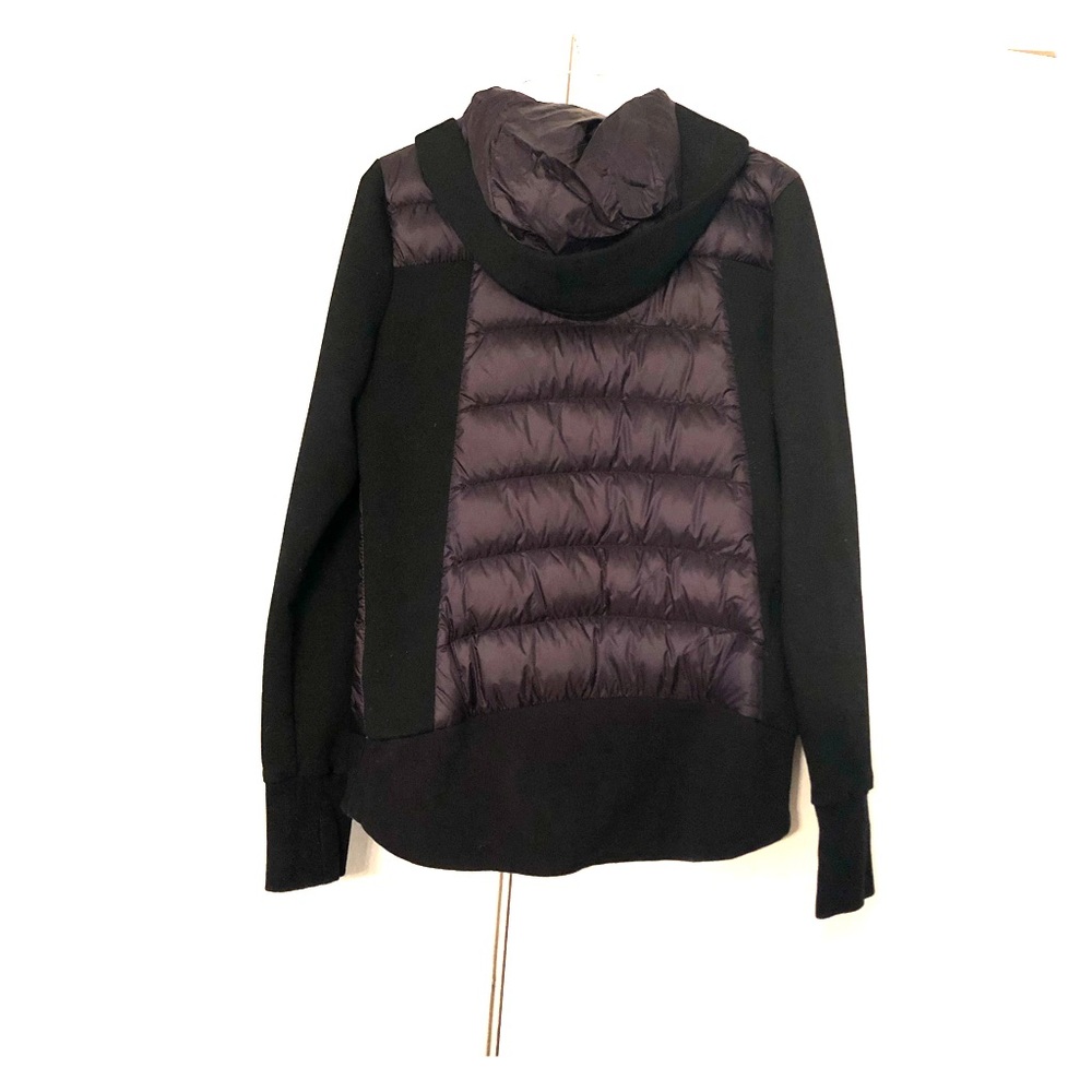 A black Michael Kors Jacket.